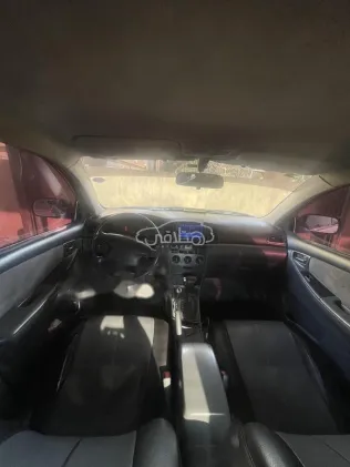 تويوتا كورولا 2003 فضي مستعملة للبيع