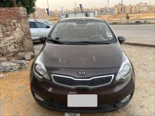 كيا ريو 2013 بني مستعملة للبيع
