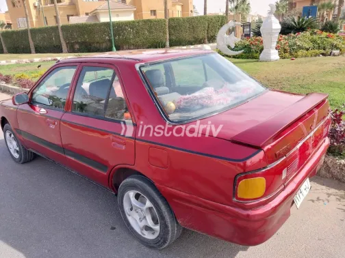 مازدا 323 1992 أبيض مستعملة للبيع - 1