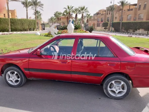 مازدا 323 1992 أبيض مستعملة للبيع - 2