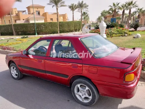 مازدا 323 1992 أبيض مستعملة للبيع - 4