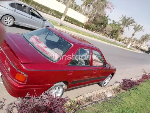 مازدا 323 1992 أبيض مستعملة للبيع - 5