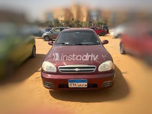 شيفروليه لانوس 2015 أحمر غامق مستعملة للبيع - 1