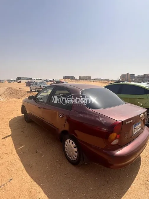 شيفروليه لانوس 2015 أحمر غامق مستعملة للبيع - 3