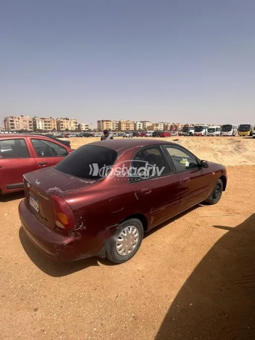 شيفروليه لانوس 2015 أحمر غامق مستعملة للبيع - 4