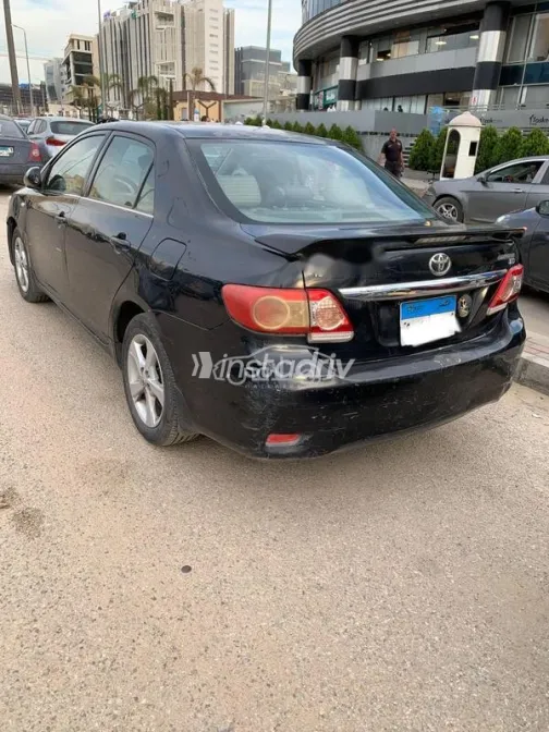 تويوتا كورولا 2011 أسود مستعملة للبيع - 1