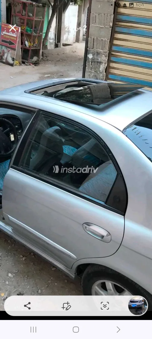 كيا سبكترا 2001 أبيض مستعملة للبيع - 3