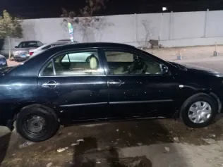 تويوتا كورولا 2007 أبيض مستعملة للبيع