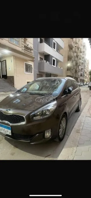 كيا كارينز 2014 موكا مستعملة للبيع