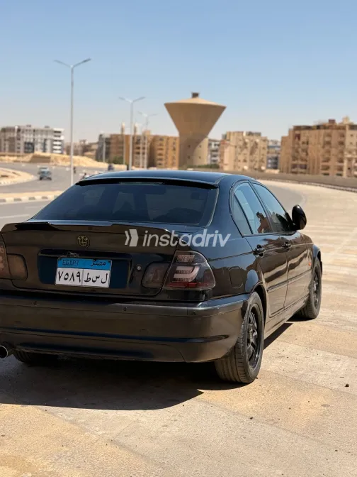 بي ام دبليو 318 2002 أبيض مستعملة للبيع - 4