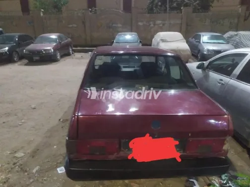 فيات شاهين 2001 أحمر غامق مستعملة للبيع - 2