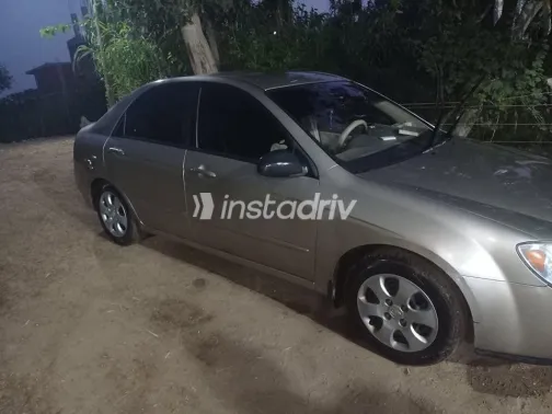 كيا سيراتو 2006 ذهبي مستعملة للبيع - 3