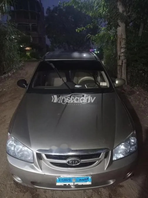 كيا سيراتو 2006 ذهبي مستعملة للبيع - 5