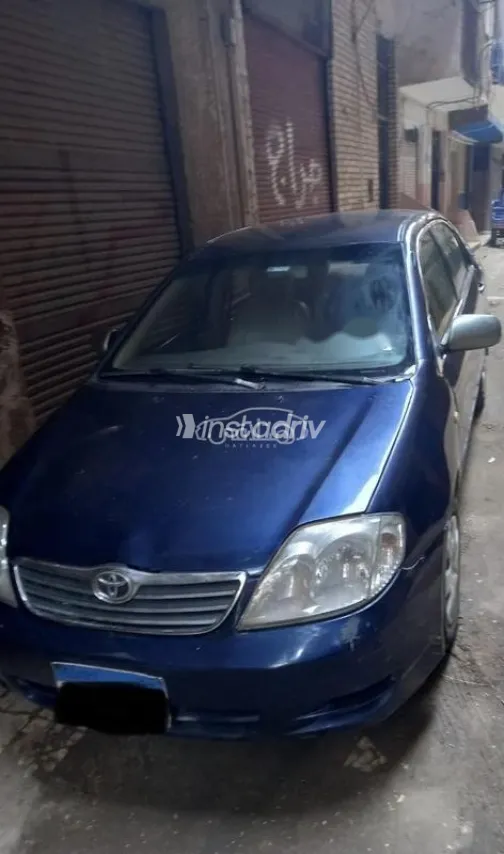 تويوتا كورولا 2003 أزرق غامق مستعملة للبيع - 1