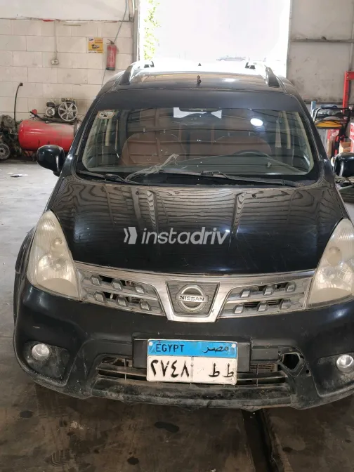 نيسان ليفينا 2009 أبيض مستعملة للبيع - 5