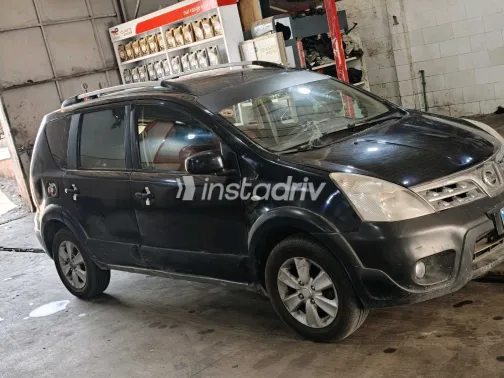 نيسان ليفينا 2009 أبيض مستعملة للبيع - 10