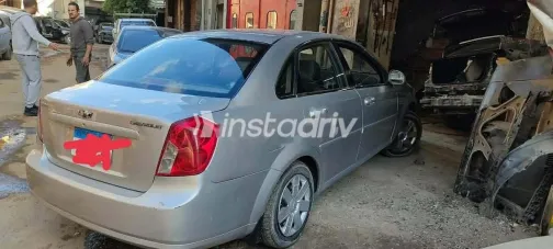 شيفروليه أوبترا 2011 فضي مستعملة للبيع - 1