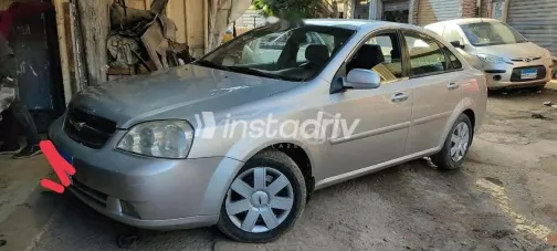 شيفروليه أوبترا 2011 فضي مستعملة للبيع - 3