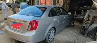 شيفروليه أوبترا 2011 فضي مستعملة للبيع