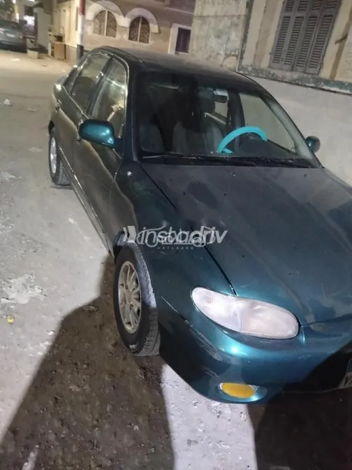 هيونداي اكسنت 2003 أخضر غامق مستعملة للبيع - 2