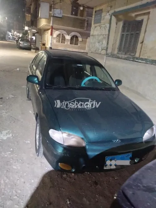 هيونداي اكسنت 2003 أخضر غامق مستعملة للبيع - 8