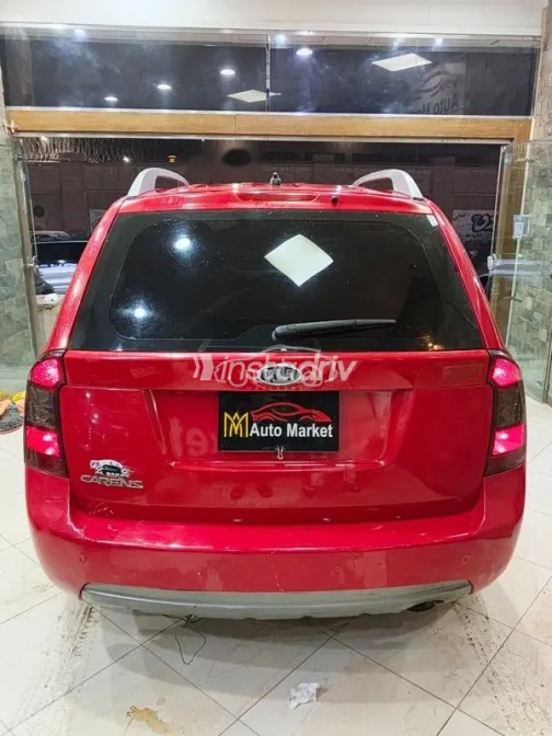 كيا كارينز 2011 أحمر مستعملة للبيع - 7