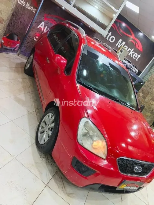 كيا كارينز 2011 أحمر مستعملة للبيع - 8