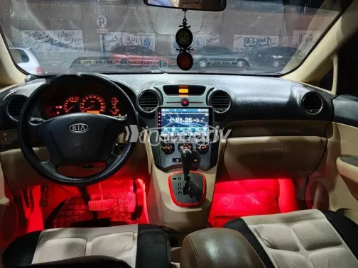 كيا كارينز 2011 أحمر مستعملة للبيع - 9