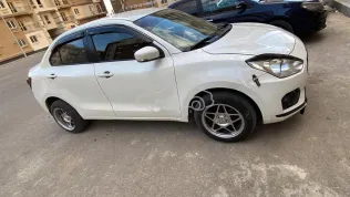 سوزوكى سويفت ديزاير 2021 أبيض مستعملة للبيع