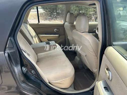 نيسان تيدا 2011 أبيض مستعملة للبيع - 4