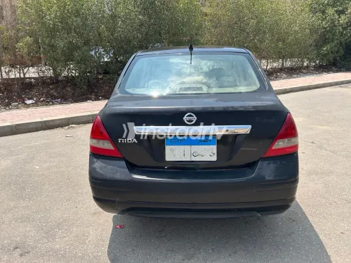 نيسان تيدا 2011 أبيض مستعملة للبيع - 7