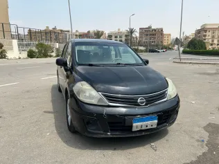 نيسان تيدا 2011 أبيض مستعملة للبيع