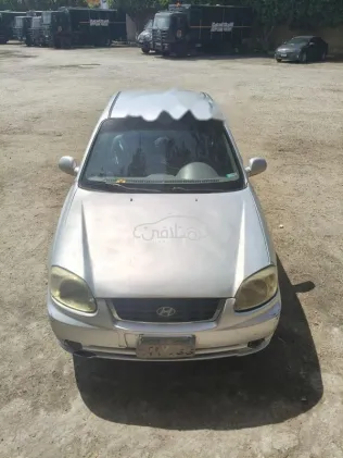 هيونداي فيرنا 2004 فضي مستعملة للبيع