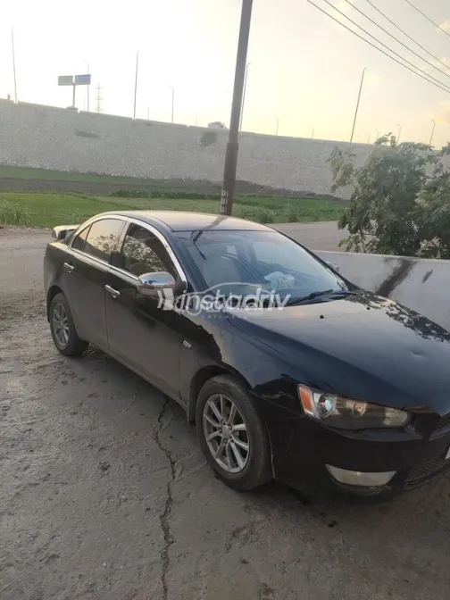 ميتسوبيشي لانسر اى اكس شارك 2015 أبيض مستعملة للبيع - 2