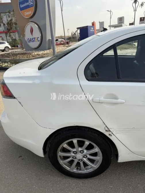 ميتسوبيشي لانسر اى اكس شارك 2014 أبيض مستعملة للبيع - 3