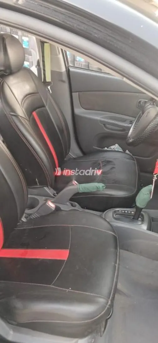 كيا ريو 2009 أسود مستعملة للبيع - 3