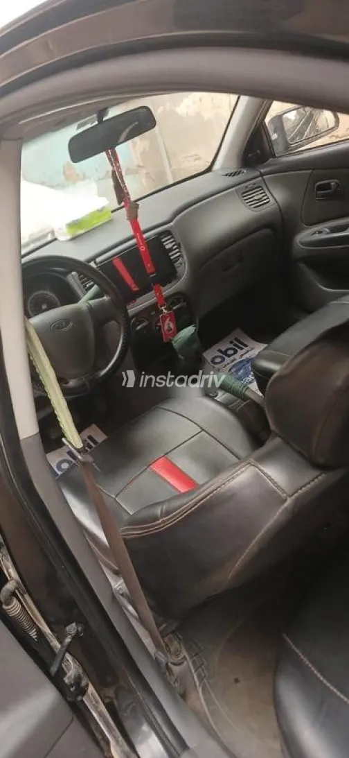 كيا ريو 2009 أسود مستعملة للبيع - 5