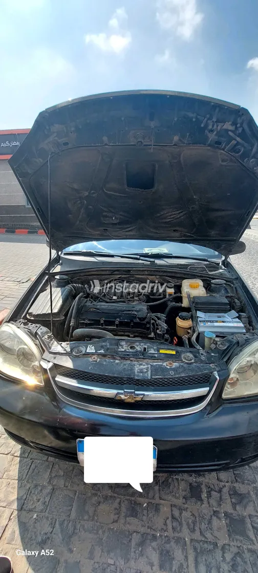 شيفروليه أوبترا 2011 أبيض مستعملة للبيع - 2