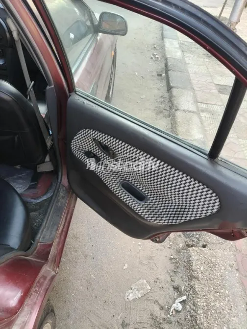 ميتسوبيشي ميراج 1999 أحمر غامق مستعملة للبيع - 3