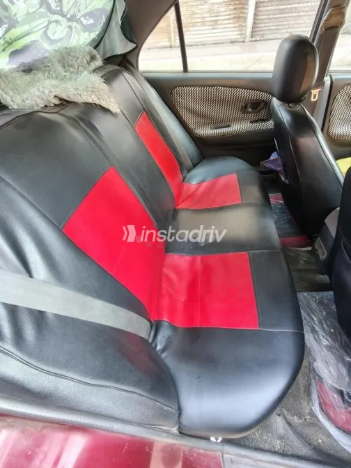 ميتسوبيشي ميراج 1999 أحمر غامق مستعملة للبيع - 5