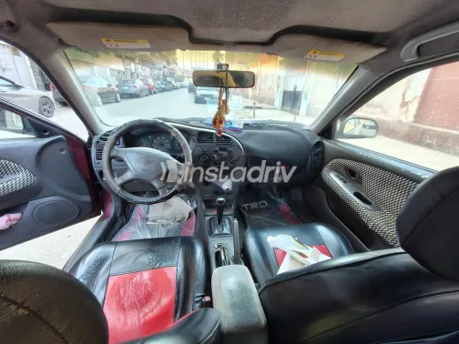 ميتسوبيشي ميراج 1999 أحمر غامق مستعملة للبيع - 4