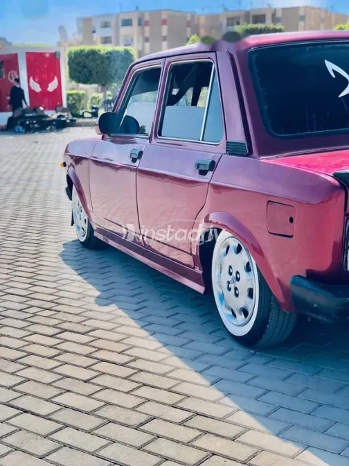 فيات 128 1998 أحمر غامق مستعملة للبيع - 5