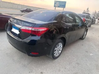 تويوتا كورولا 2015 أسود مستعملة للبيع