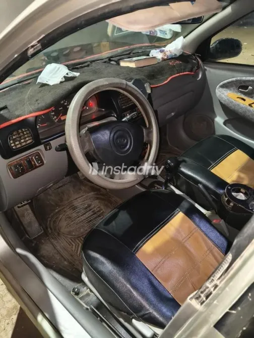 كيا ريو 2001 رمادي مستعملة للبيع - 7