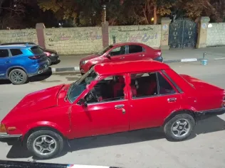 مازدا 323 1982 أحمر مستعملة للبيع