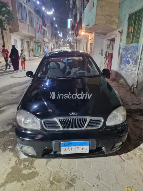 دايو لانوس 2004 أبيض مستعملة للبيع - 2