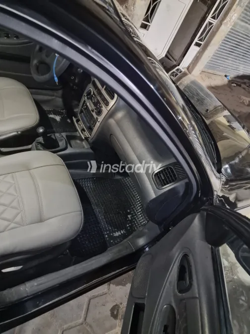 دايو لانوس 2004 أبيض مستعملة للبيع - 9