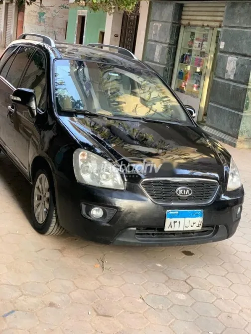 كيا كارينز 2012 أسود مستعملة للبيع - 3