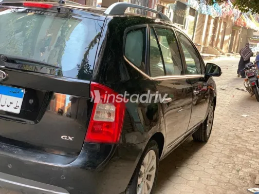 كيا كارينز 2012 أسود مستعملة للبيع - 4