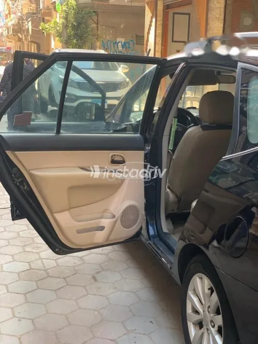 كيا كارينز 2012 أسود مستعملة للبيع - 6